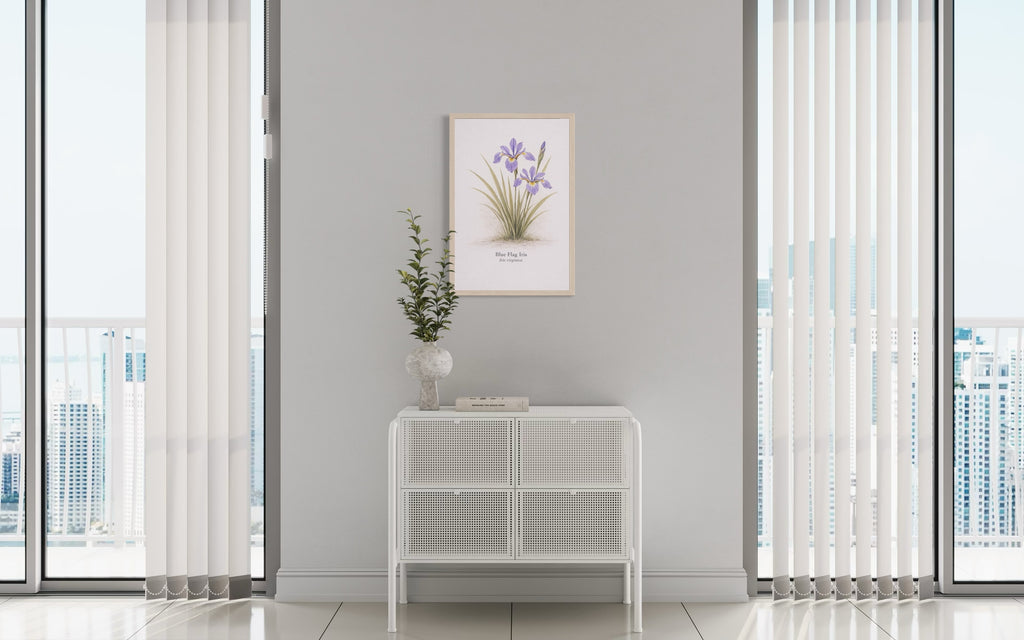 Modern interior with a side table, plant, and framed picture on a gray wall.