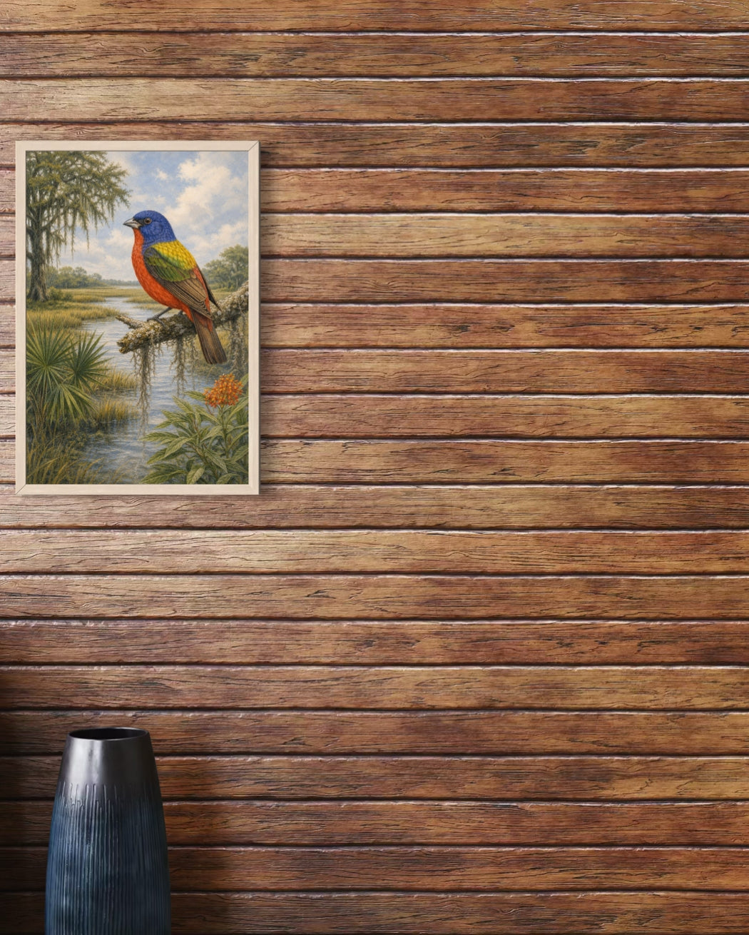 Framed painting of a colorful bird on a wooden wall with a vase below.